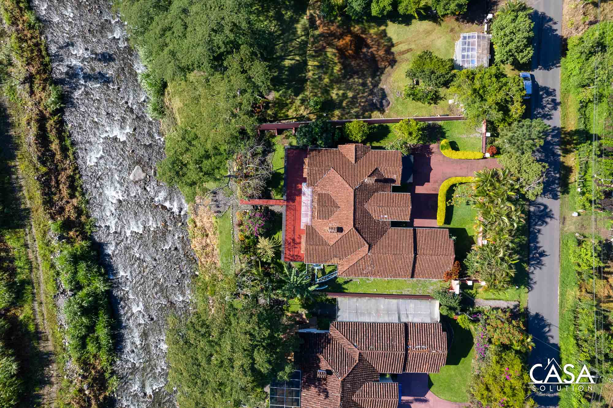 Sold by Casa Solution! Downtown Boquete Riverfront Home Plus Apartment for Sale – Great Location