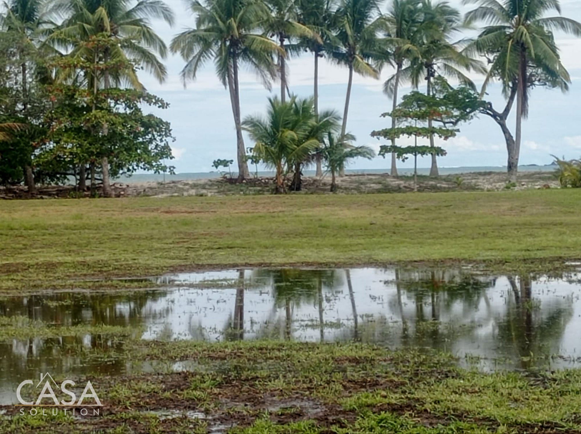 Price Reduction!! Your Own Tropical Getaway! On this 3,239 Sq. Meters Beachfront Lot 18 for Sale in Rincon Beach Estates, Boca Chica, Panama - One of Three Available photo 2