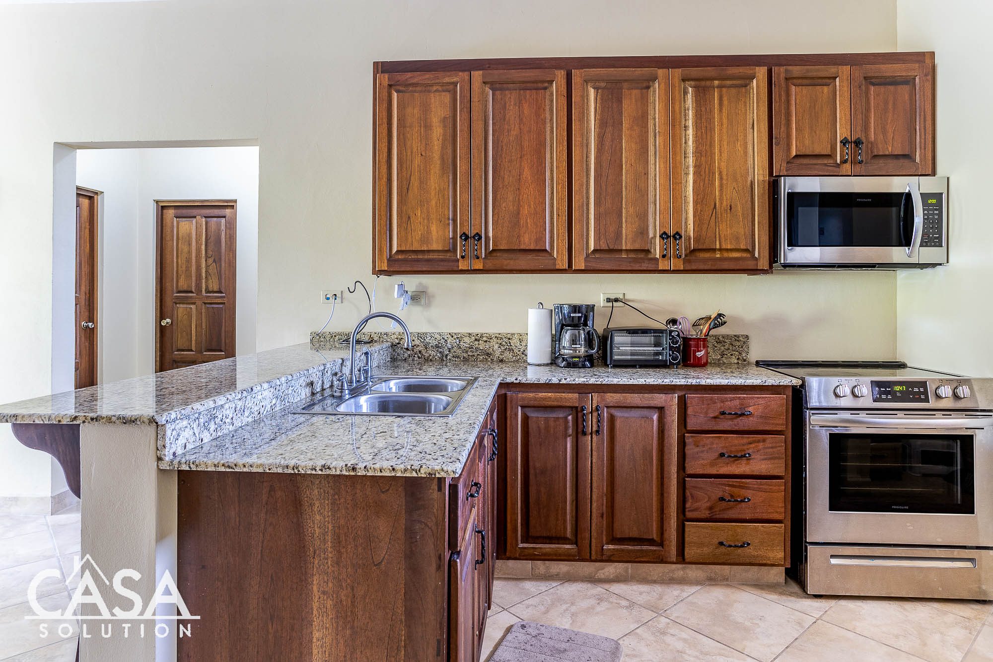 Sold by Casa Solution - Stunning and Furnished Valle Escondido Apartment with Valley, Lake & Golf Course Views for Sale in Downtown Boquete, Panama photo 11