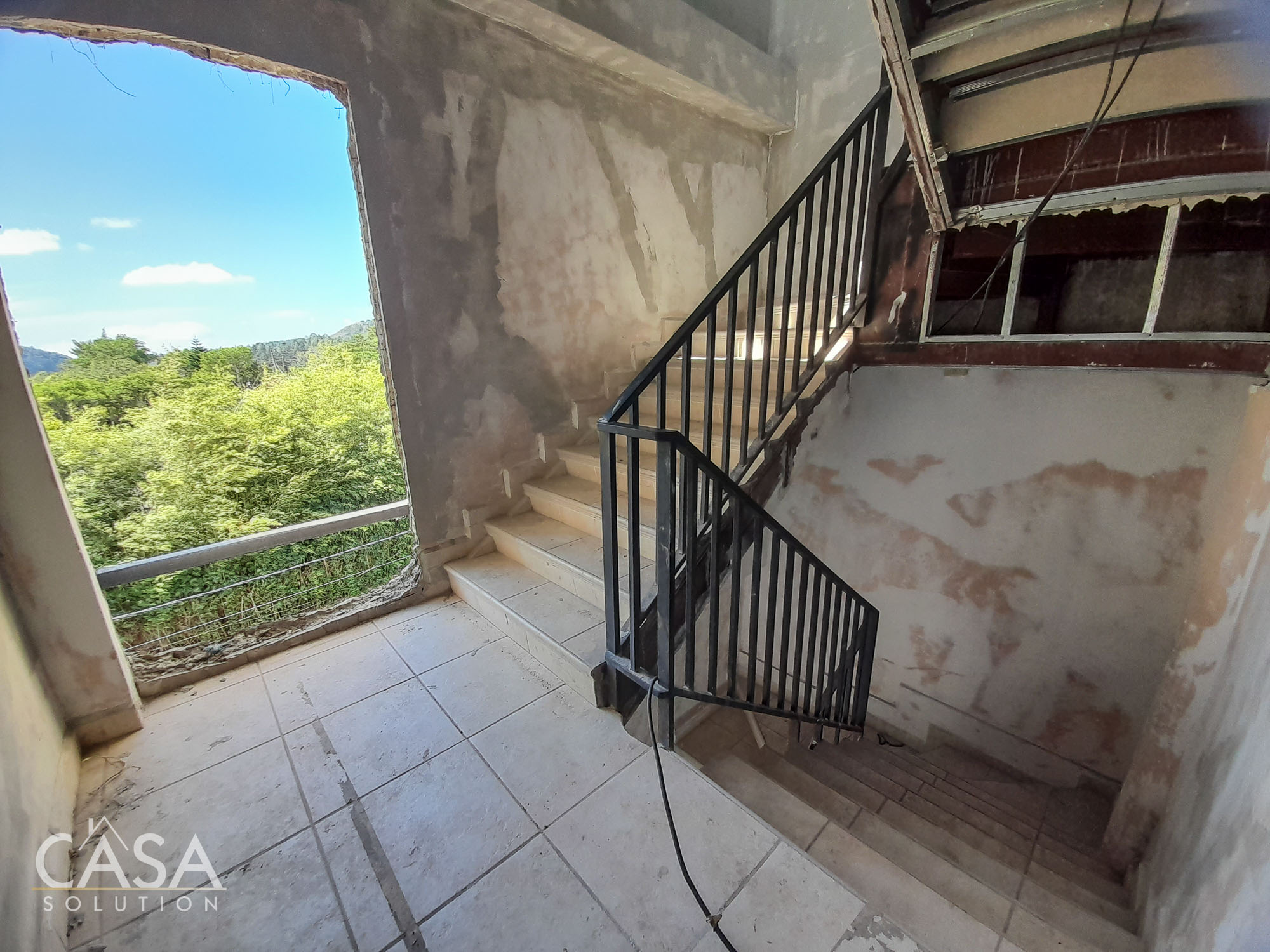 SPECIAL $50,000 DISCOUNT AVAILABLE DURING THE PRESALE only with casa solution - Apartment for Sale in the Top Floor of a 3 Level Building, in Downtown Boquete, Chiriqui