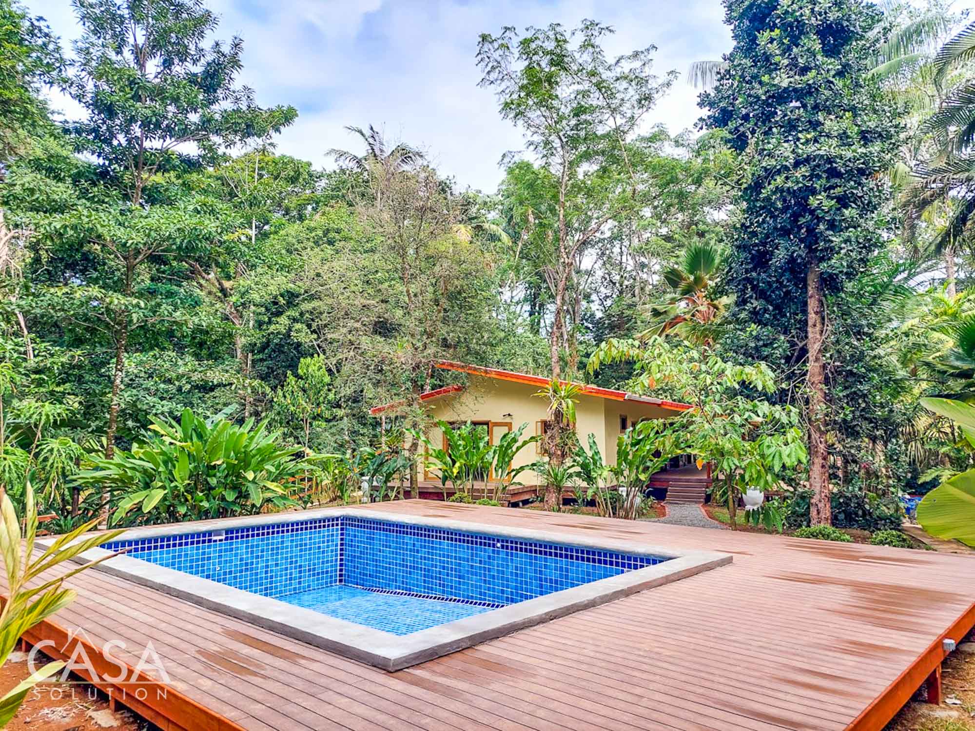Price Reduction! Newly constructed 2-bedroom villa in Finca Los Monos Botanical Garden, Isla Colon. With sea views, solar power & pool. photo 3