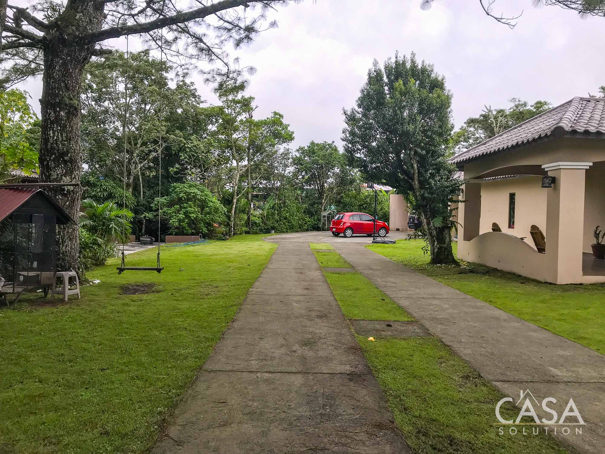 Sold by Owner! Modern 3-bedroom home for Sale in El Valle, Volcán with spacious interiors, a large yard, and a serene streamside setting photo 6