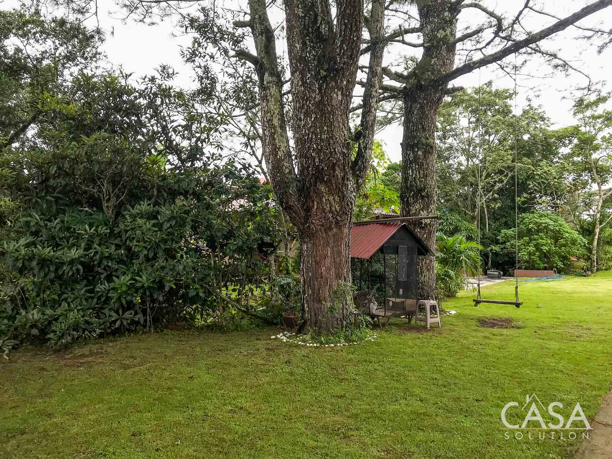 Sold by Owner! Modern 3-bedroom home for Sale in El Valle, Volcán with spacious interiors, a large yard, and a serene streamside setting photo 11