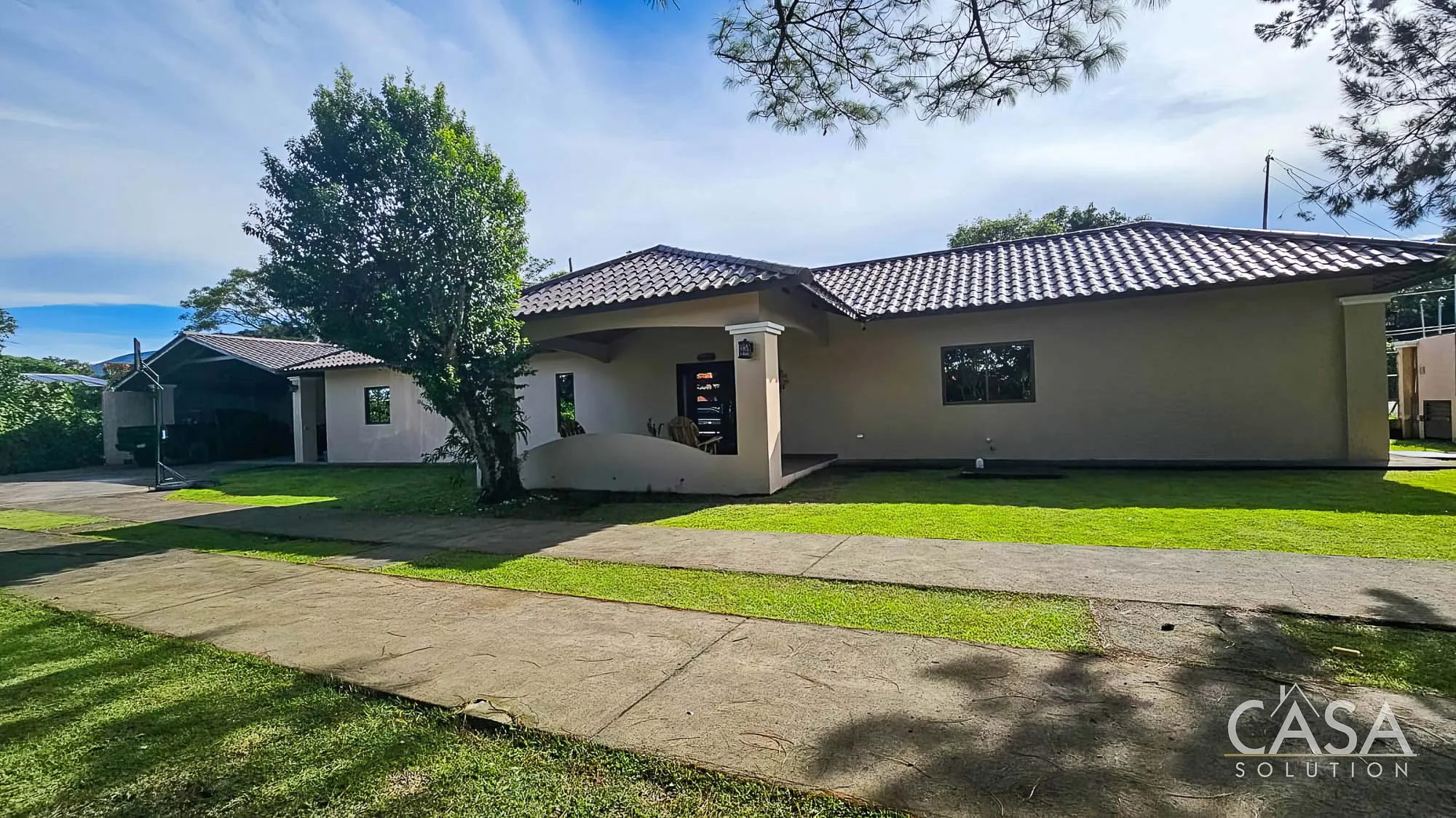 Sold by Owner! Modern 3-bedroom home for Sale in El Valle, Volcán with spacious interiors, a large yard, and a serene streamside setting photo 2