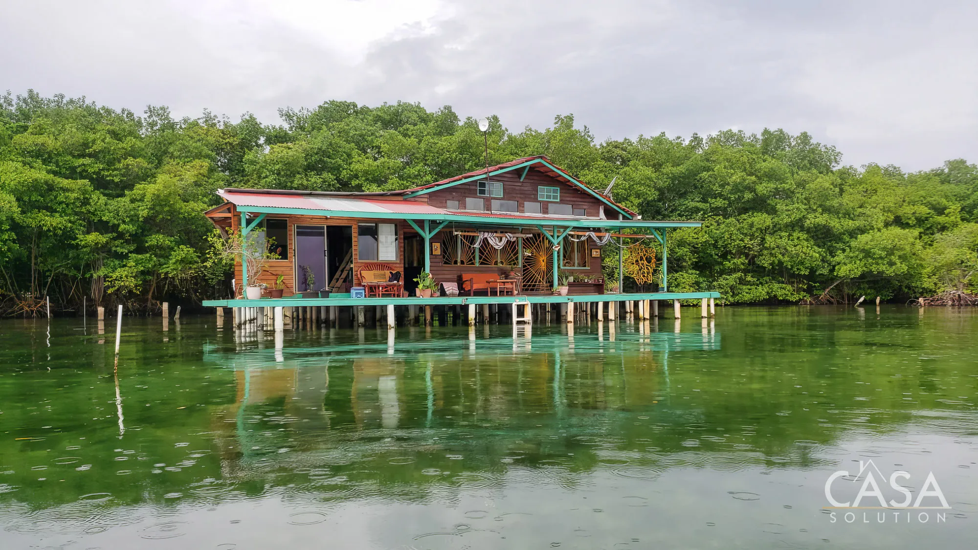 Private 3-bedroom over-the-water home for Sale in Saigon Bay, Bocas del Toro, with sunset views, water access, and rental income potential photo 5