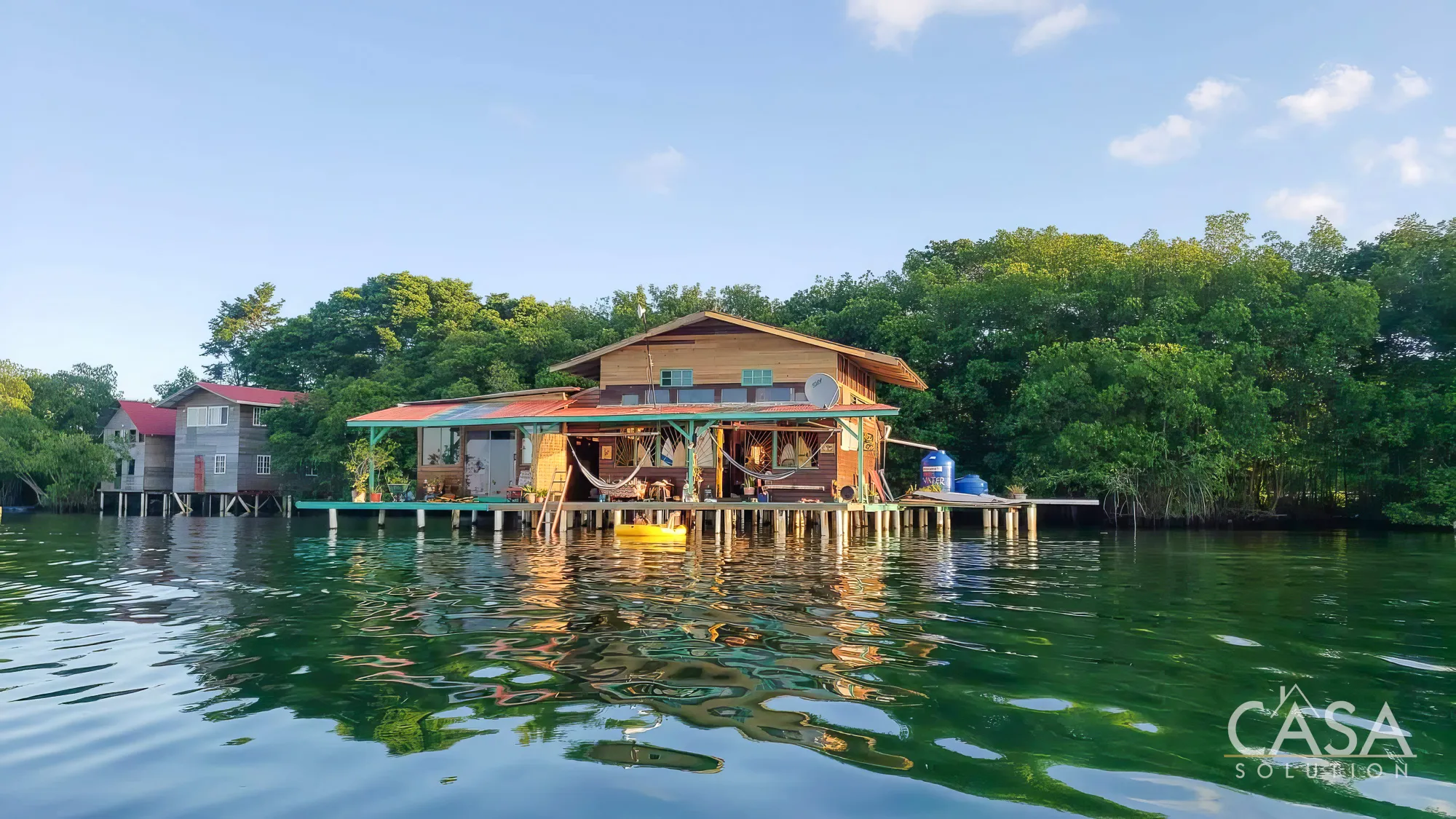 Private 3-bedroom over-the-water home for Sale in Saigon Bay, Bocas del Toro, with sunset views, water access, and rental income potential photo 3